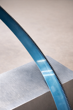 Arntz CS-1 carbon bandsaw blade installed on workshop bandsaw machine