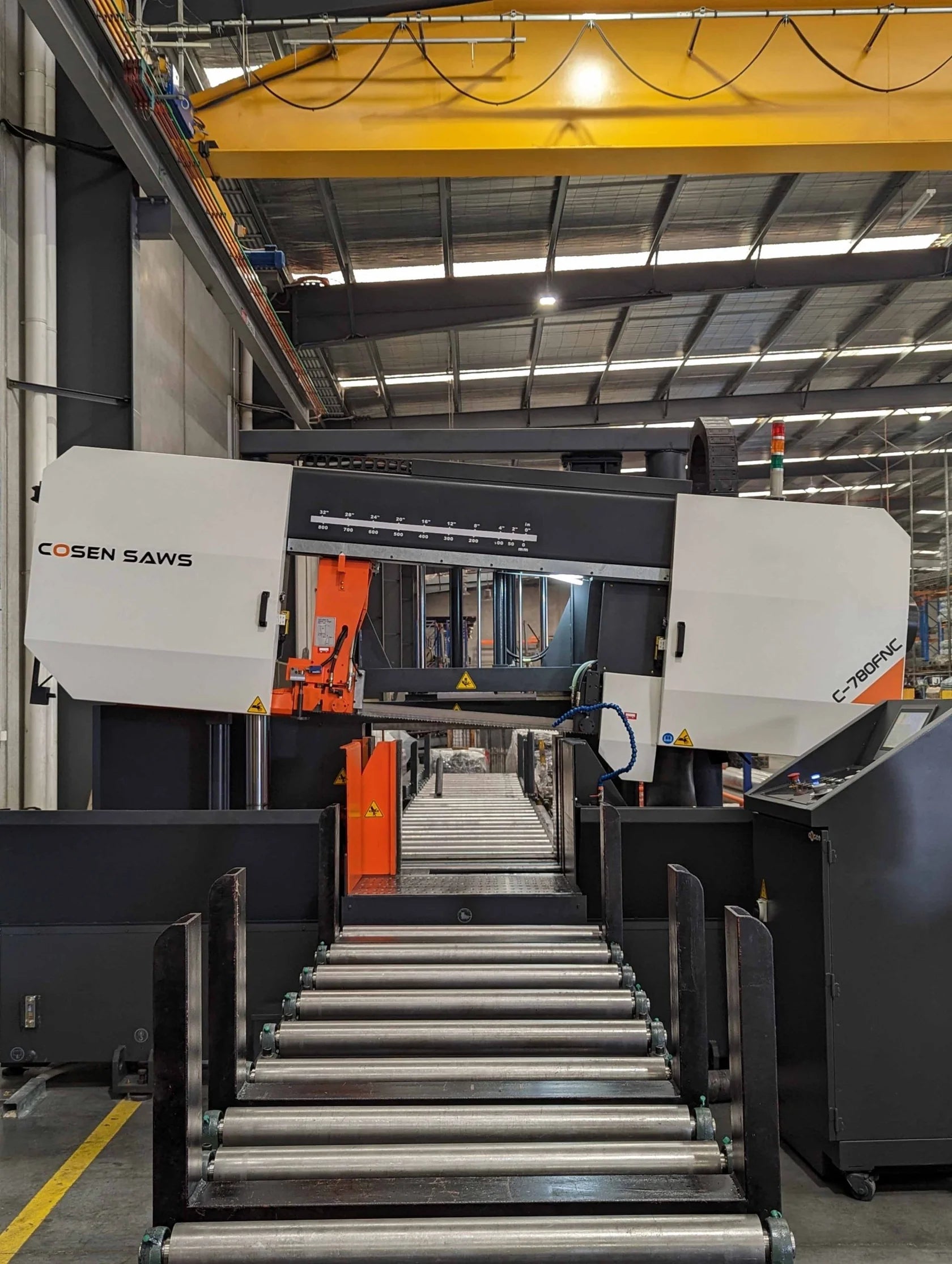 Cosen C-780FNC automatic bandsaw machine in industrial facility